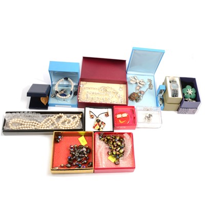 Lot 219 - A collection of modern costume jewellery in branded boxes.