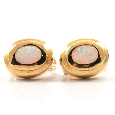 Lot 143 - A pair of opal earrings.