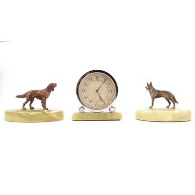 Lot 117 - 1930s Art Deco desk clock, with two cold-painted dog ashtrays as garniture