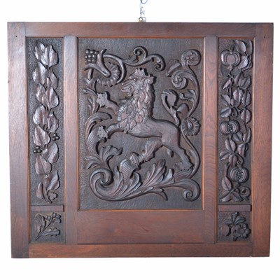 Lot 328 - Carved wood panel, designed with a lion rampant