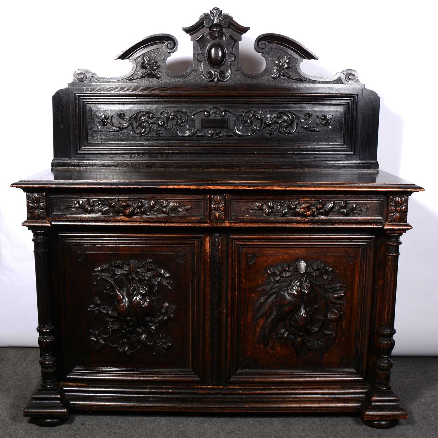 Lot 355 - Continental carved oak sideboard