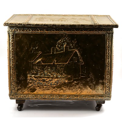 Lot 160 - Trivet; embossed brass log bin, width 51cm; and a book stand.