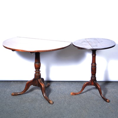 Lot 391 - Two oak tripod tables