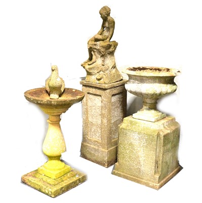 Lot 529 - Garden ornaments; urn on a plinth, nymph and a bird bath.