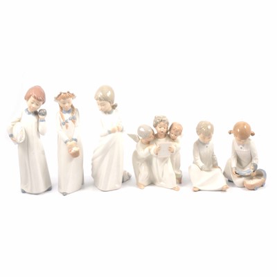 Lot 13 - Five Nao figurines and one Lladro group