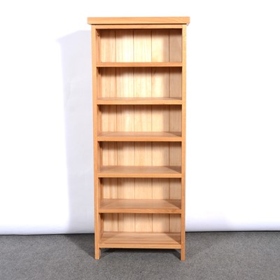 Lot 372 - Light oak narrow bookcase