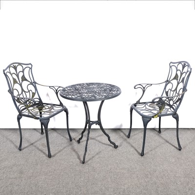 Lot 580 - Black wrought metal patio table and two armchairs