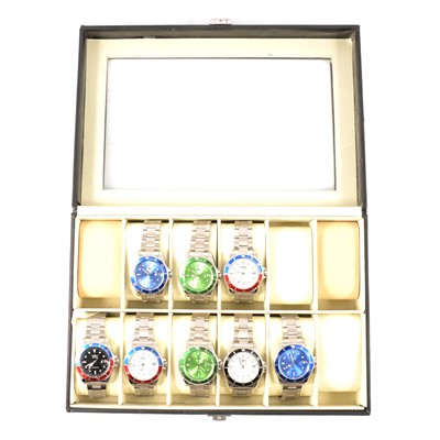 Lot 317 - Winner - eight steel gentleman's automatic wristwatches in twelve section storage box