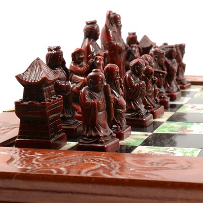 Lot 70 - Chinese simulated jade chess set, in a folding...