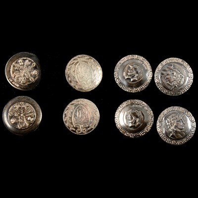 Lot 401 - Four pairs of large silver buttons.