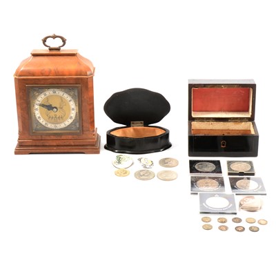 Lot 136 - An Elliott walnut mantle clock, ebony box, another wooden box and commemorative crowns.