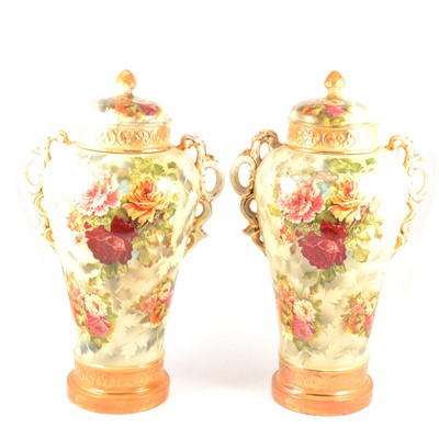 Lot 81 - Pair of Staffordshire pottery urns and a similar vase