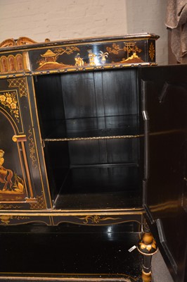 Lot 247 - Black ground Chinoiserie side cupboard