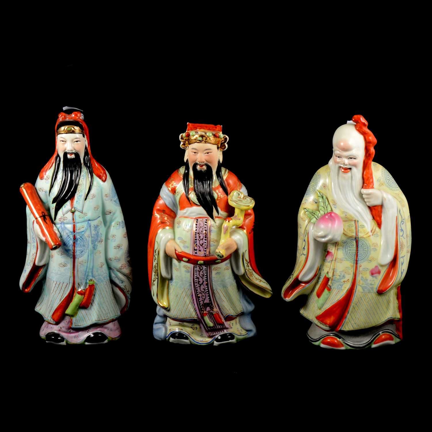 Lot 20 - Three Japanese pottery models, immortals, 30cm.