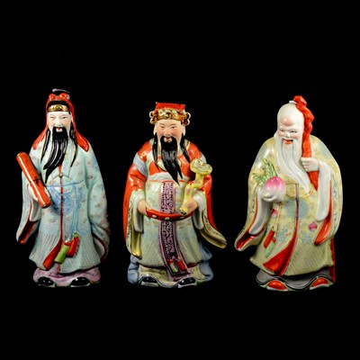 Lot 20 - Three Japanese pottery models, immortals, 30cm.