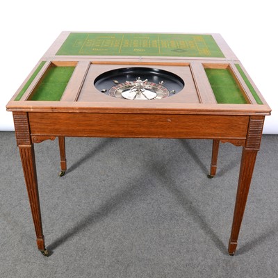 Lot 264 - Edwardian oak games table