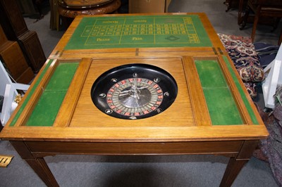 Lot 264 - Edwardian oak games table