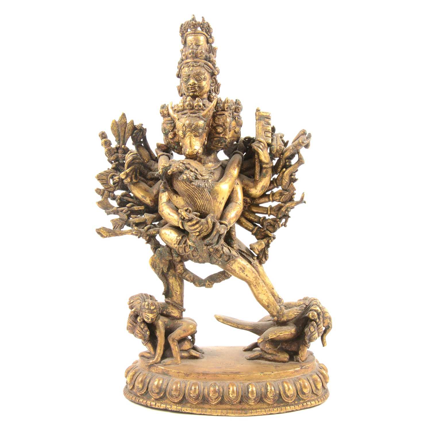 Lot 160 - A Tibetan gilt-copper group