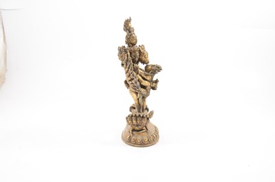 Lot 160 - A Tibetan gilt-copper group