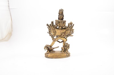 Lot 160 - A Tibetan gilt-copper group