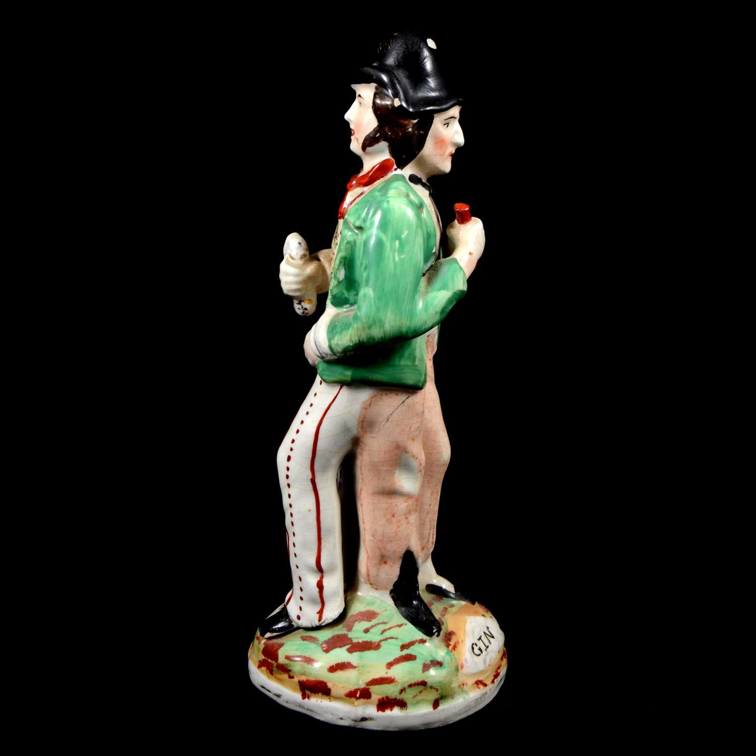 Lot 42 - Twin-sided Staffordshire Temperance figure, 'Water and Gin', 19th century