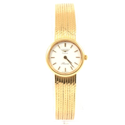 Lot 322 - Longines - a lady's Presence 9 carat yellow gold bracelet watch.