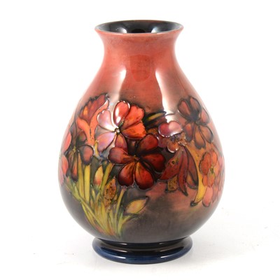Lot 1036 - Walter Moorcroft for Moorcroft Pottery, 'Spring Flowers, a flambe vase, circa 1950
