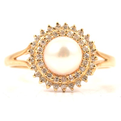 Lot 347 - A cultured pearl and diamond dress ring.