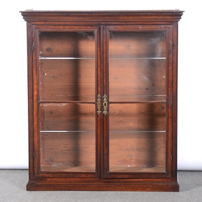 Lot 388 - A mahogany and walnut banded bookcase