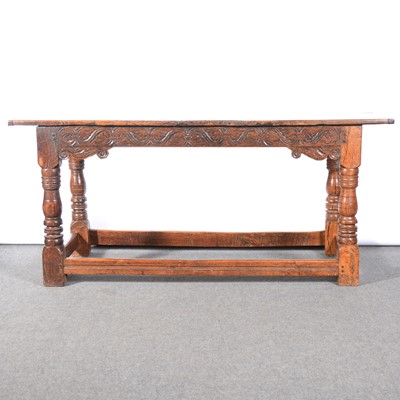 Lot 387 - A boarded oak refectory table