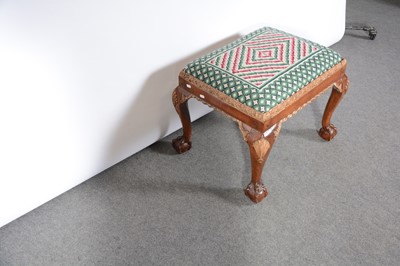Lot 47 - A George I style walnut and parcel gilt stool