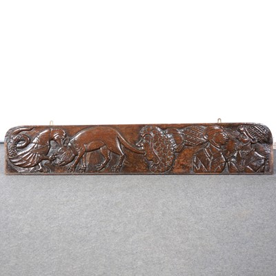 Lot 12 - A carved oak panel