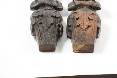 Lot 11 - A pair of carved oak term figures, Adam and Eve
