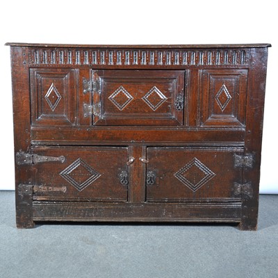Lot 75 - A joined oak dole cupboard,  late 17th century