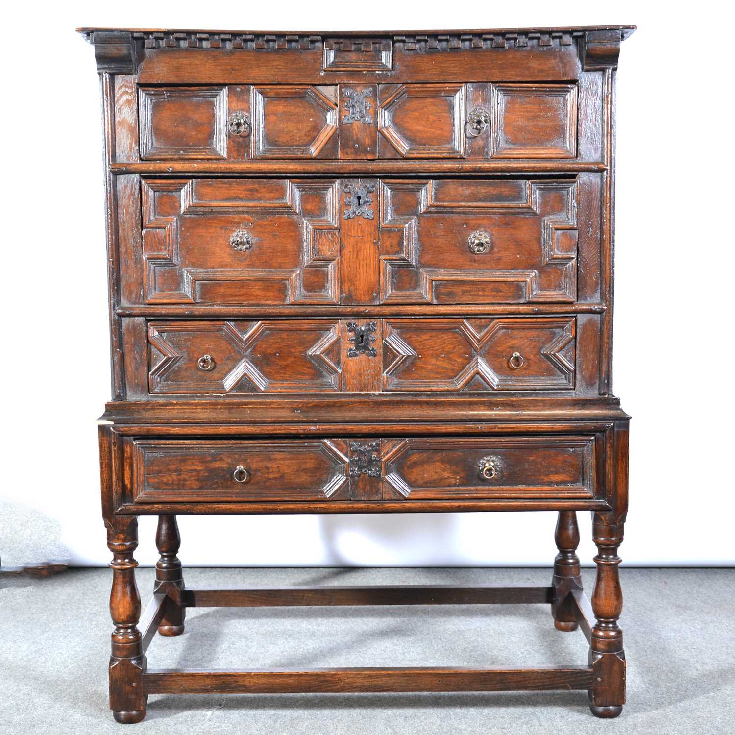 Lot 320 - A joined oak chest on stand