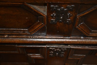 Lot 320 - A joined oak chest on stand