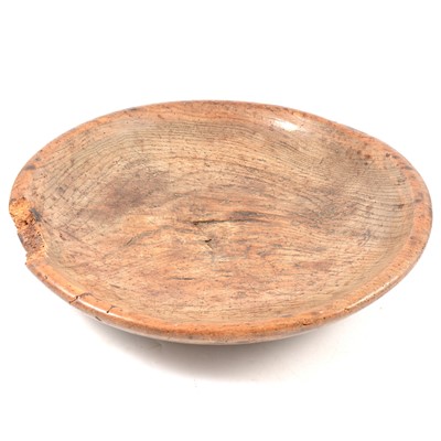 Lot 63 - An old elm cream settling bowl