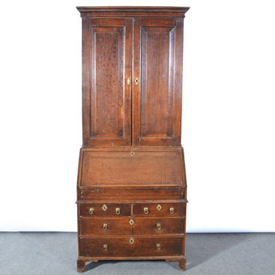 Lot 318 - An oak bureau bookcase