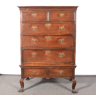 Lot 321 - An oak chest on stand