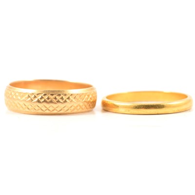 Lot 98 - Two gold wedding bands.