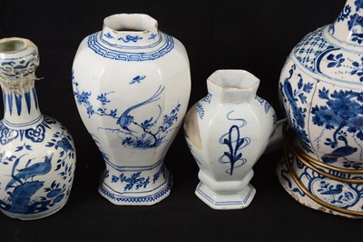 Lot 83 - Four delft blue and white vases
