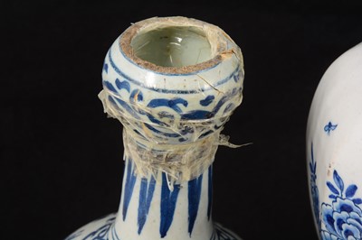 Lot 83 - Four delft blue and white vases
