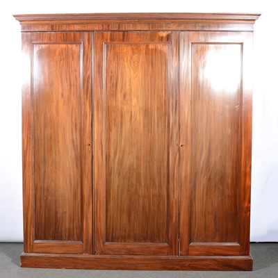 Lot 385 - Late Victorian walnut triple wardrobe