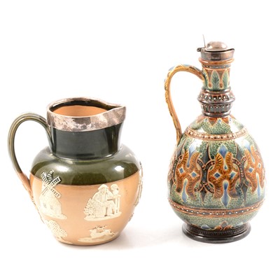 Lot 12 - Doulton Lambeth - silver mounted hunting jug and a ewer by Frank Butler