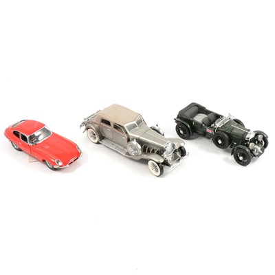 Lot 143 - Franklin Mint 1:24 scales model cars, three including 1961 Jaguar E-type coupe, all boxed.