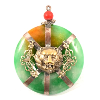 Lot 188 - A jade circular pendant.