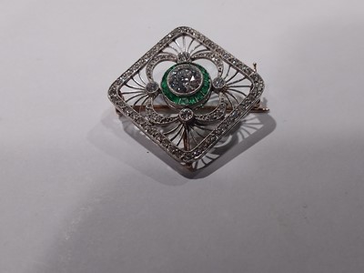 Lot 148 - An Art Deco ammended to style as exact date cannot be ascertained emerald and diamond brooch.