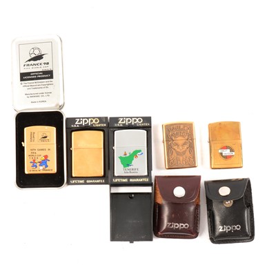 Lot 186 - Five Zippo cigarette lighters including Fifa World Cup France 98 and Harley Davidson etc