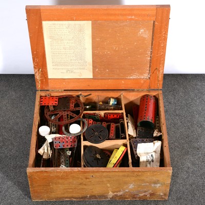 Lot 205 - Meccano, one wooden box full, including gears, wheels, strips, girders etc.