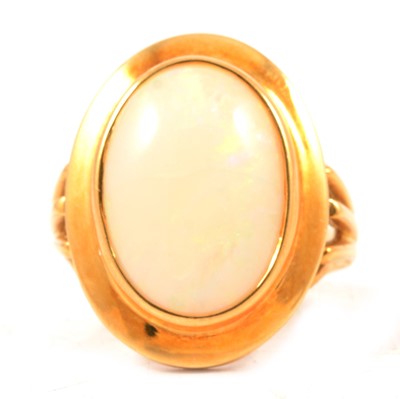 Lot 67 - An opal dress ring.